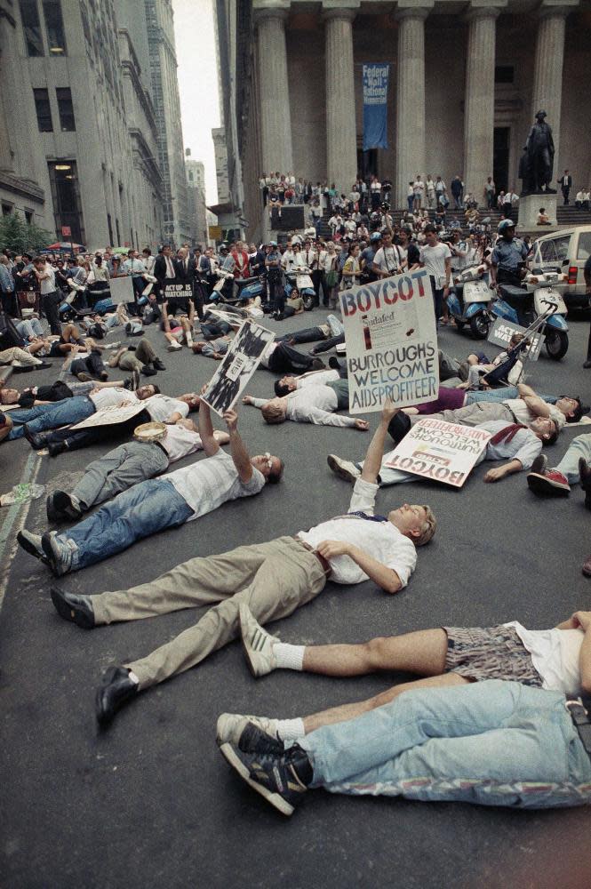 Protestors in 1989 lie on the street in front of the New York Stock Exchange in a demonstration against the high cost of the Aids treatment drug AZT.