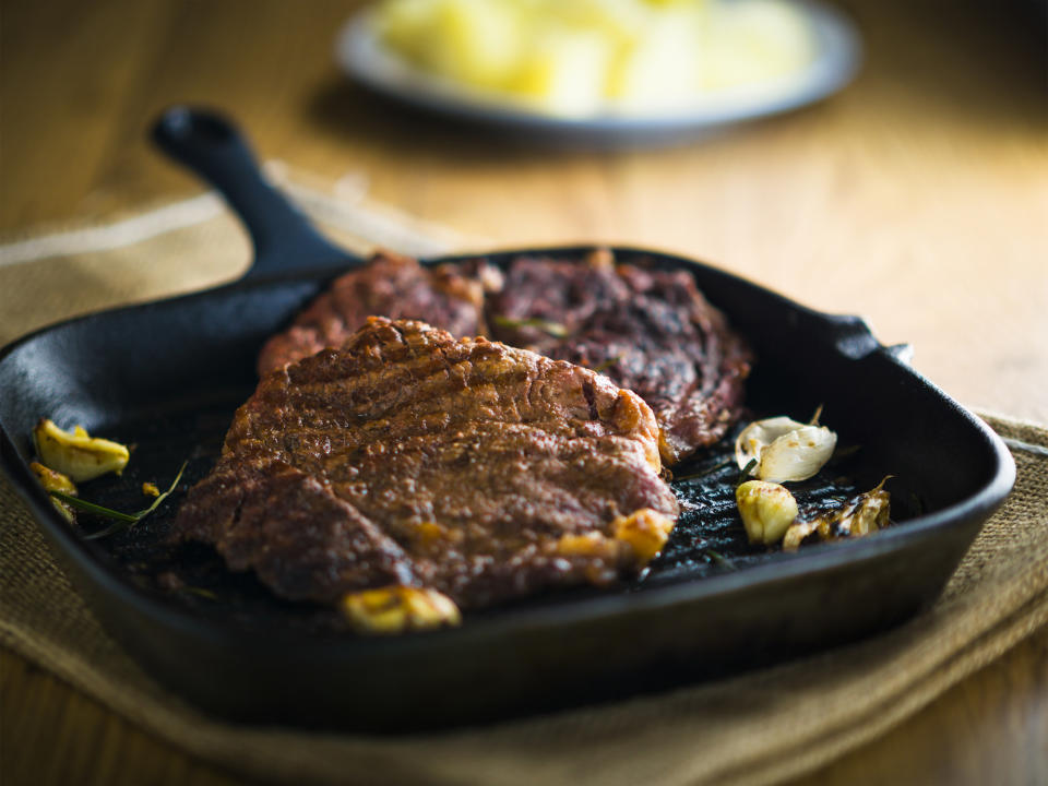 Steak in a cast iron grill pan