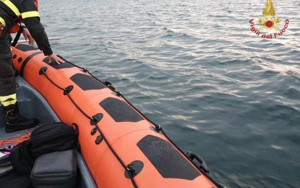 The boat overturned on Sunday evening between the towns of Sesto Calende and Arona