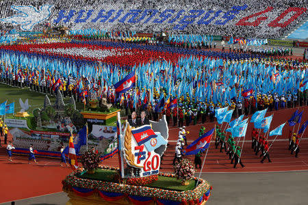 Cambodians attend an event to mark the 40th anniversary of the toppling of Pol Pot's Khmer Rouge regime at the Olympic stadium in Phnom Penh, Cambodia, January 7, 2019. REUTERS/Samrang Pring