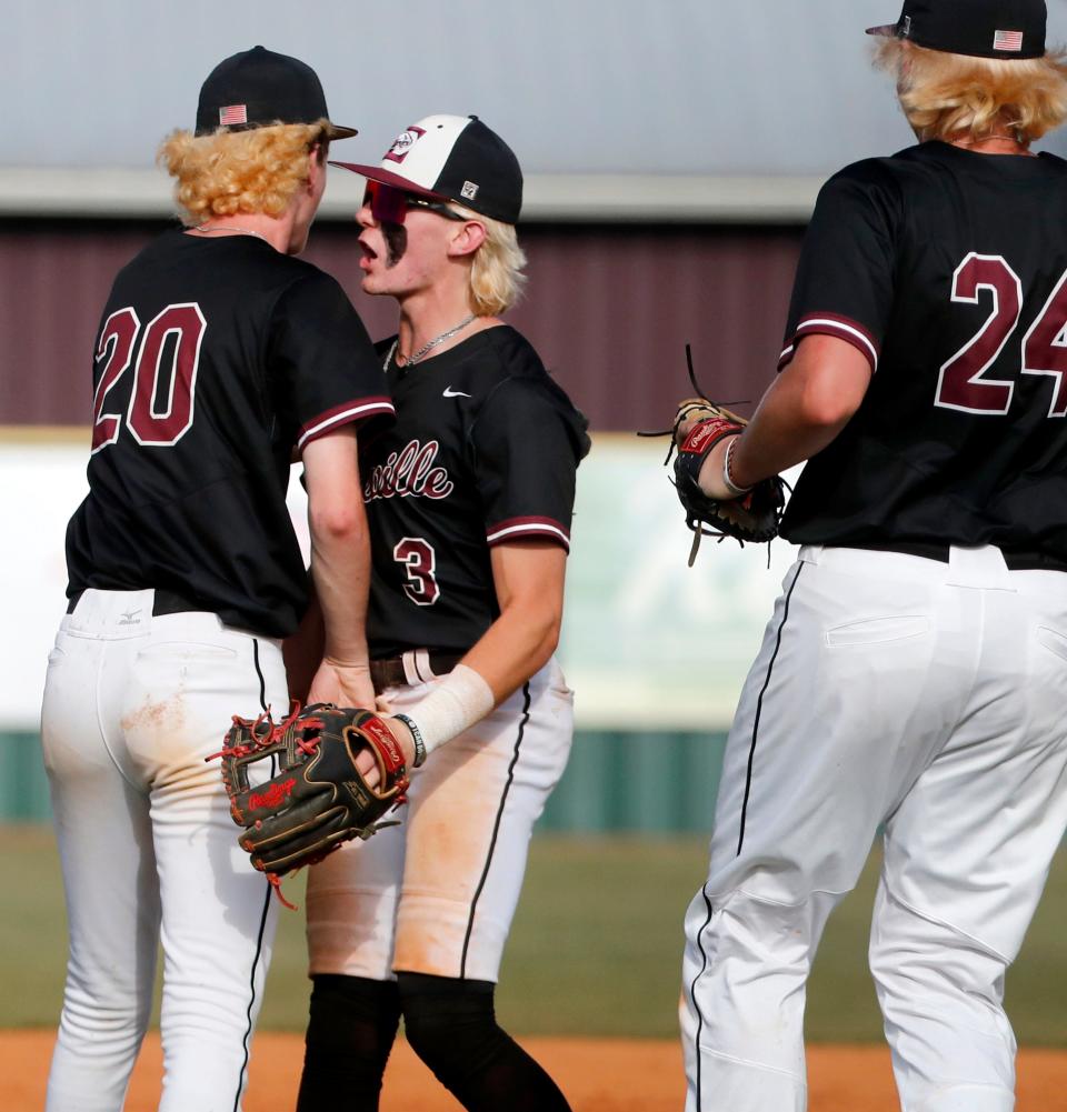 Eagleville's pitcher Brody Gleason (20) and Eagleville's shortstop Brayden Baker (3) celebrates the win over South Pittsburg that qualifies them to play in the State Championship game as Eagleville's first baseman Donovan Drew (24) looks on during the third day of Spring Fling, in the 2024 TSSAA Baseball State Tournament on Thursday, May 23, 2024.