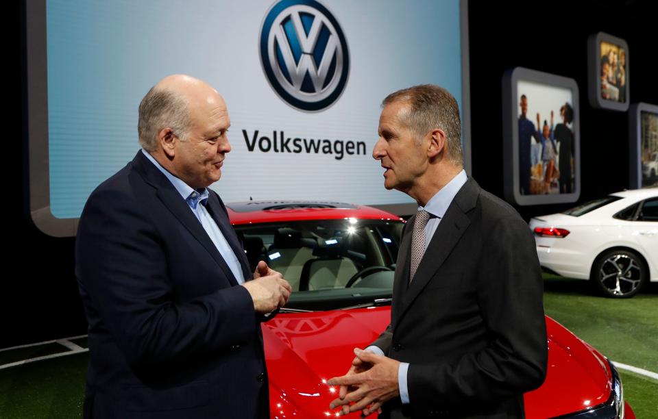 Ford Motor Co. President and CEO, Jim Hackett, left, meets with Dr. Herbert Diess, CEO of Volkswagen AG, Monday, Jan. 14, 2019, at the North American International Auto Show in Detroit.