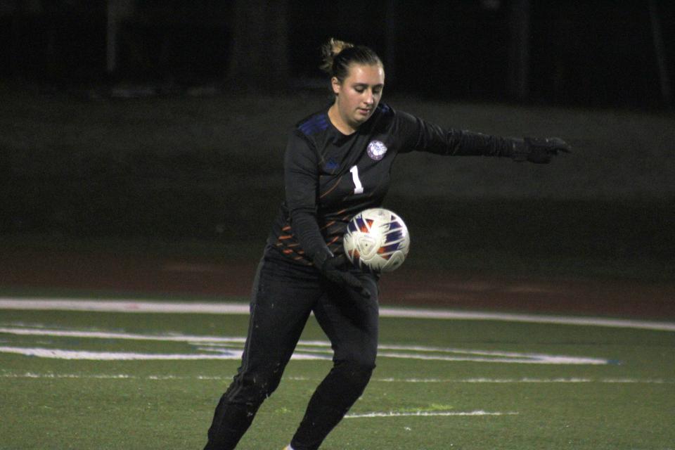 Bolles goalkeeper Zoe Lieb (1) prepares to punt the ball upfield.