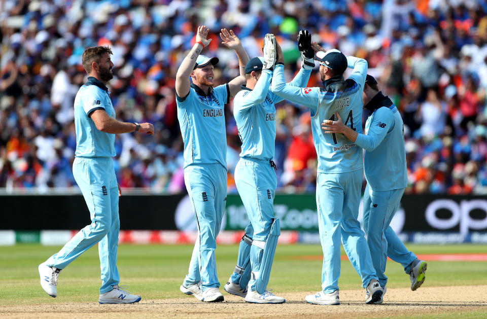 England's Liam Plunkett (left) celebrates taking the wicket of India's Virat Kohli, caught by James Vince (second right), during the ICC Cricket World Cup group stage match at Edgbaston, Birmingham. (Photo by David Davies/PA Images via Getty Images)