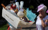 <p>A racegoer during Ladies Day at the Royal Ascot horse races in Ascot, Britain on June 22, 2017. (Toby Melville/Reuters) </p>