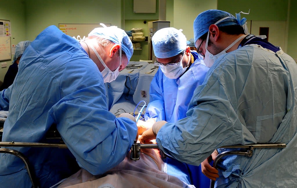 Surgeons in theatre (stock image) (PA Archive)