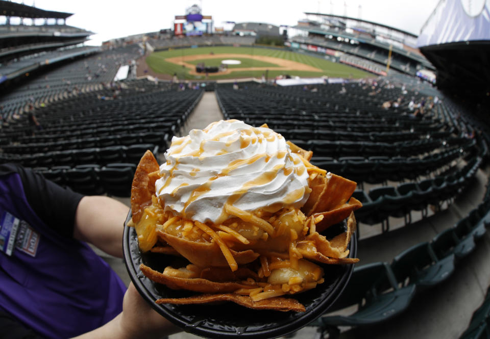Coors Field had some odd findings in an ESPN stadium food report. (AP)