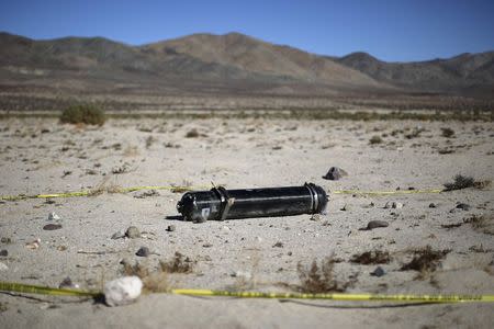 Wreckage from the crash of Virgin Galactic's SpaceShipTwo lies in the desert near Cantil, California November 2, 2014. REUTERS/David McNew