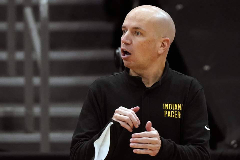 Indiana Pacers head coach Nate Bjorkgren calls a play against the Toronto Raptors during the first half of an NBA basketball game Sunday, May 16, 2021, in Tampa, Fla. (AP Photo/Chris O'Meara)