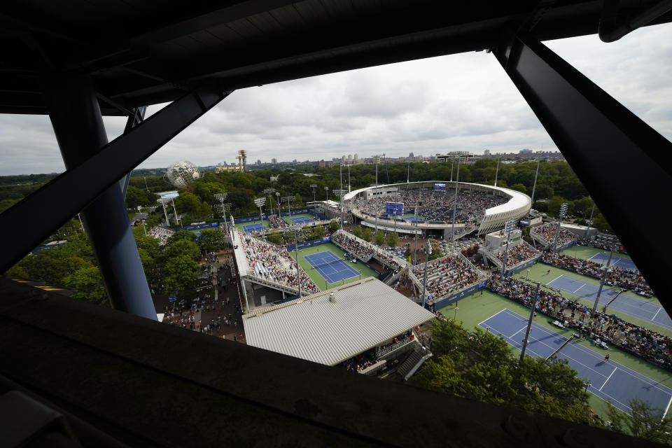 Tennis fans watch play during the first round of the U.S. Open tennis championships, Monday, Aug. 28, 2023, in New York. (AP Photo/Manu Fernandez)