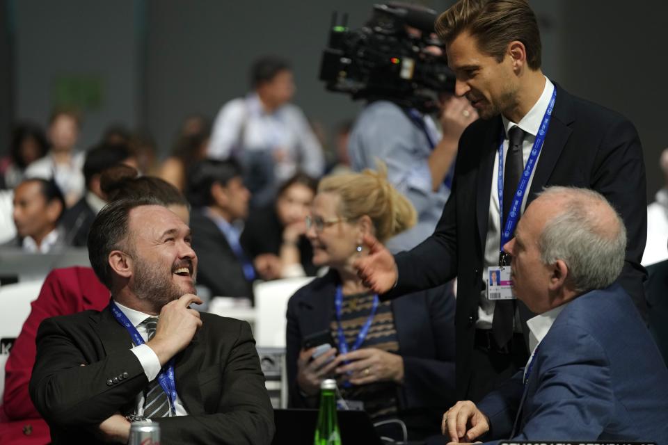 Denmark's Minister for Climate Dan Jorgensen, left, attends a stocktaking plenary session at the COP28 U.N. Climate Summit, Saturday, Dec. 9, 2023, in Dubai, United Arab Emirates. (AP Photo/Peter Dejong)