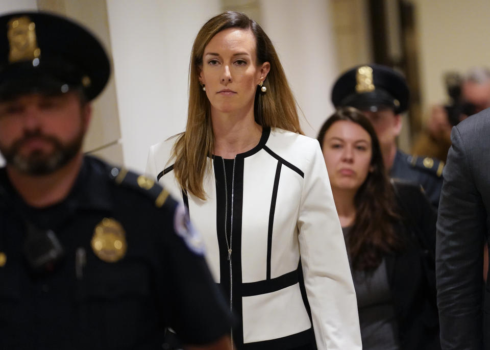 Jennifer Williams, a special adviser to Vice President Mike Pence for Europe and Russia who is a career foreign service officer, departs after a closed-door interview in the impeachment inquiry on President Donald Trump's efforts to press Ukraine to investigate his political rival, Joe Biden, at the Capitol in Washington, Thursday, Nov. 7, 2019. (AP Photo/J. Scott Applewhite)
