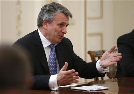 Ben van Beurden, chief executive officer of Royal Dutch Shell, gestures during a meeting with Russian President Vladimir Putin at the Novo-Ogaryovo state residence outside Moscow April 18, 2014. REUTERS/Maxim Shipenkov/POOL