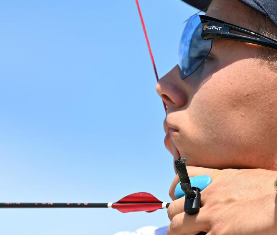 Hungarian archer Matyas Balogh aims for the target during the men’s individual ranking round.