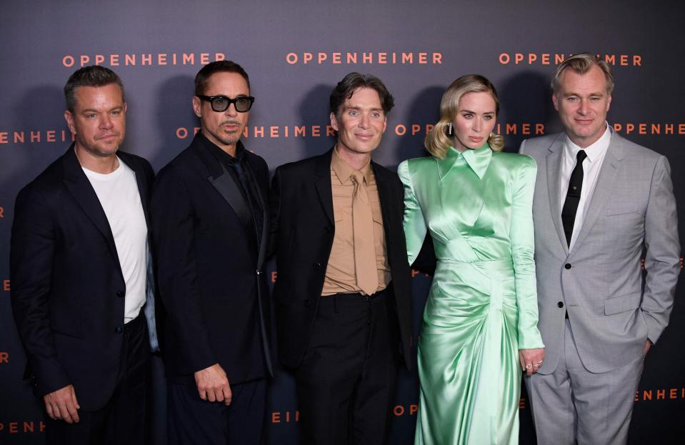July 11, 2023 : (LtoR) US actors Matt Damon and Robert Downey Jr., Irish actor Cillian Murphy, US-British actress Emily Blunt and US-British film direcotor Christopher Nolan pose upon their arrival for the "Premiere" of the movie "Oppenheimer" at the Grand Rex cinema in Paris.
