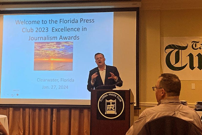Orlando Sentinel columnist Scott Maxwell speaks during the 2023 Florida Press Club's Excellence in Journalism Awards ceremony on Saturday night in Clearwater Beach.