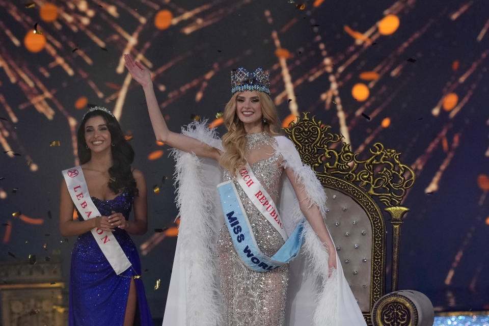 Krystyna Pyszková of Czech Republic waves after she was crowned Miss World in Mumbai, India, Saturday, Mar. 9, 2024. (AP Photo/Rajanish Kakade)