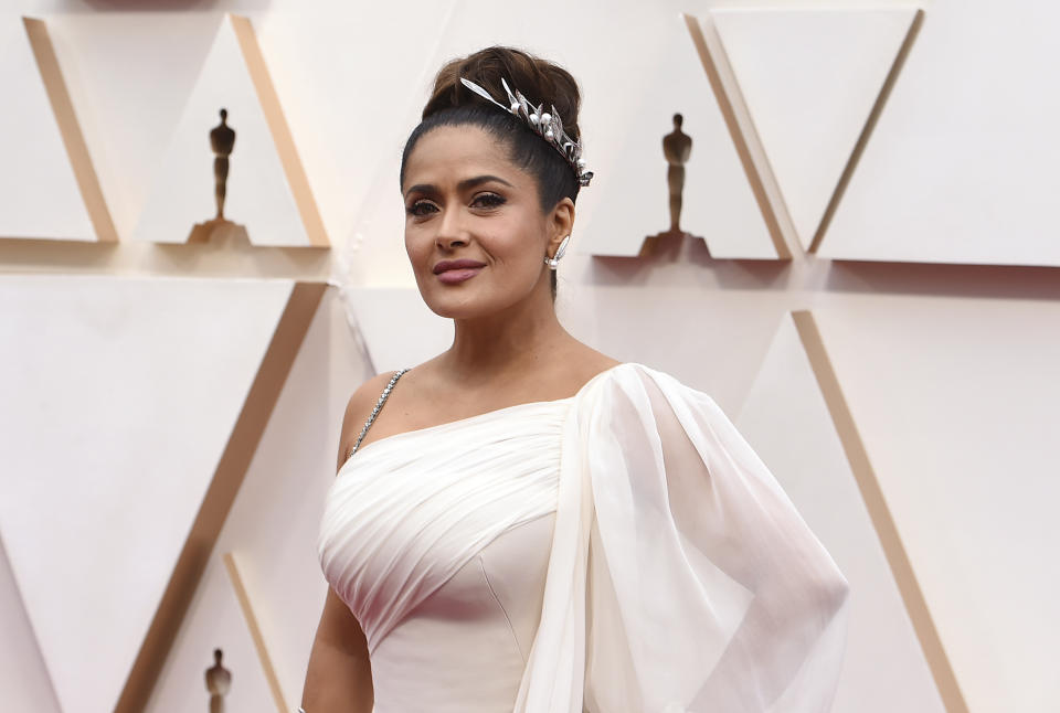 Salma Hayek arrives at the Oscars on Sunday, Feb. 9, 2020, at the Dolby Theatre in Los Angeles. (Photo by Jordan Strauss/Invision/AP)