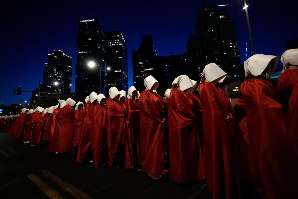 Israeli women's rights activists dressed as characters in the popular television series, 