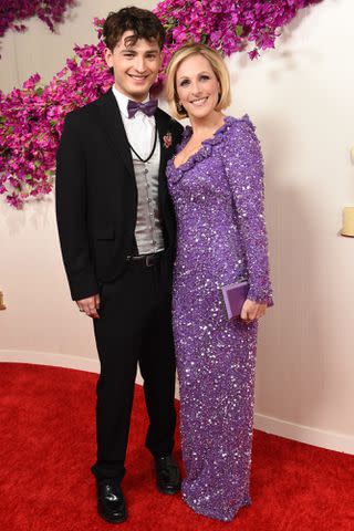 <p>Gregg DeGuire/WWD via Getty</p> Marlee Matlin and Tyler Daniel Grandalski