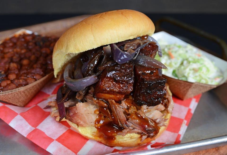 The Boss Hog sandwich piles burnt ends over pulled pork at Okeechobee Prime Barbecue.