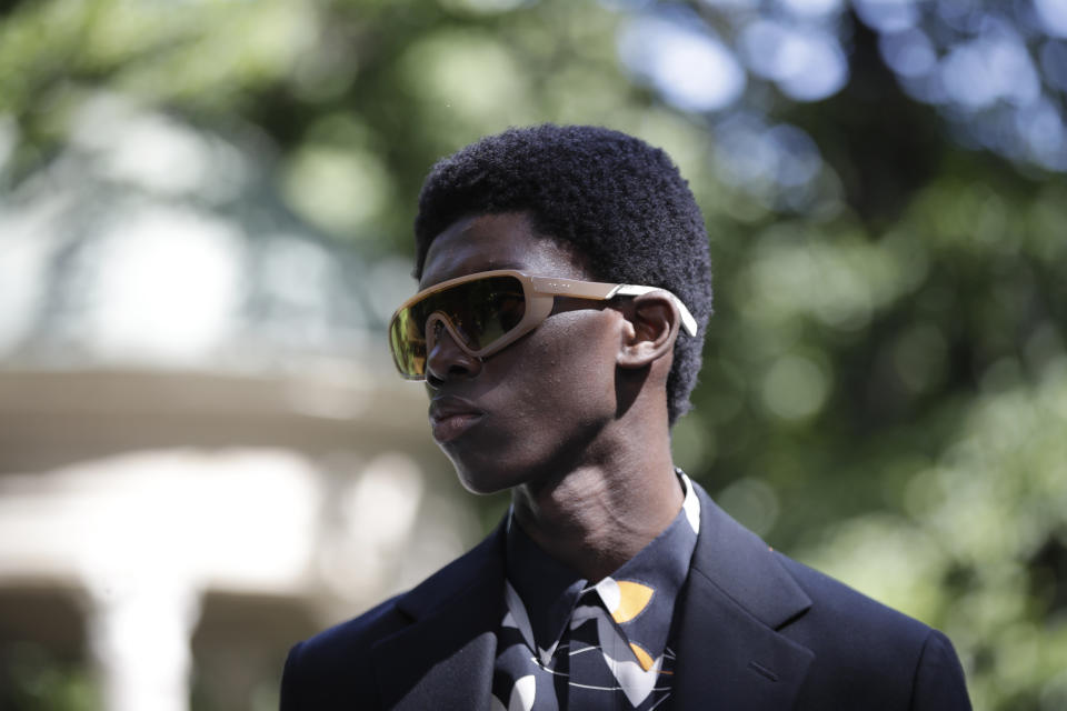 A model wears a creation as part of the Fendi men's Spring-Summer 2020 collection, unveiled during the fashion week, in Milan, Italy, Monday, June 17, 2019. (AP Photo/Luca Bruno)