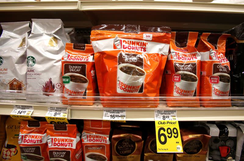 FILE PHOTO: Dunkin' Donuts coffee packs are pictured alongside other coffee brands on the shelves of a grocery store in Pasadena