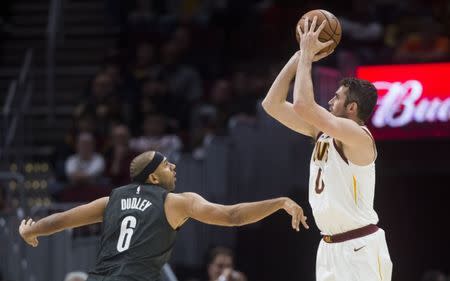 FILE PHOTO: Oct 24, 2018; Cleveland, OH, USA; Cleveland Cavaliers forward Kevin Love (0) shoots over the defense of Brooklyn Nets forward Jared Dudley (6) during the second half at Quicken Loans Arena. Mandatory Credit: Ken Blaze-USA TODAY Sports/File Photo