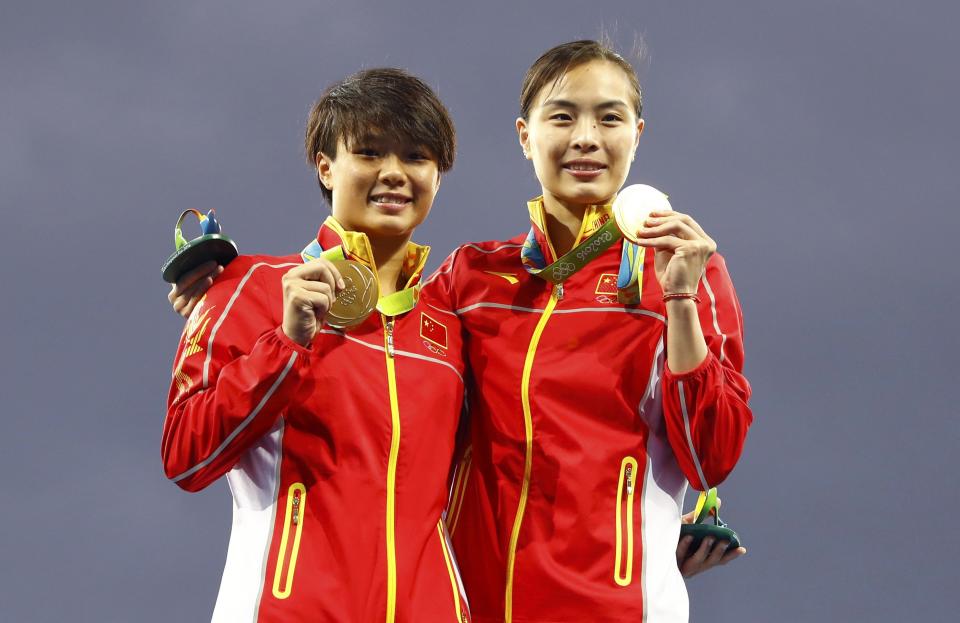 Diving - Women's Synchronised 3m Springboard Victory Ceremony