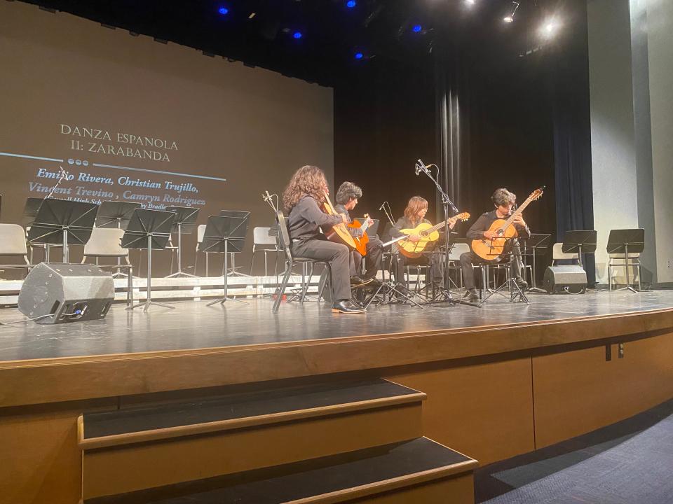 A Carroll High School quartet, including Emilio Rivera, Christian Trujillo, Camryn Rodriquez and Vincent Trevino, performs a piece Thursday at Corpus Christi ISD's guitar orchestra concert and showcase in preparation for UIL competitions in May.