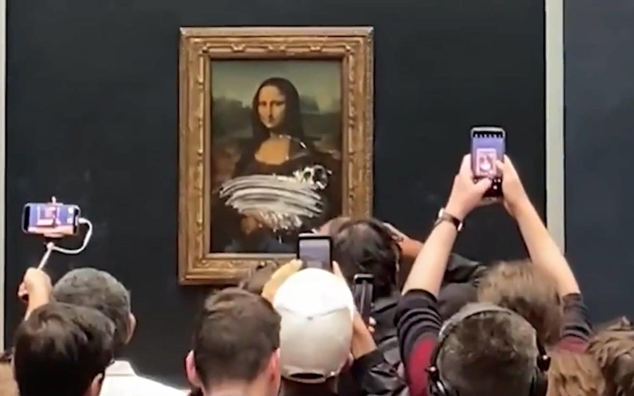 The Mona Lisa covered in icing at the Louvre museum in Paris - Telegraph