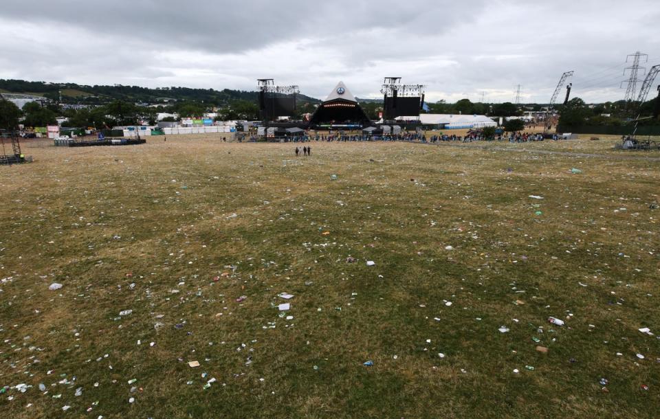Clean up operation at the Pyramid Stage on Monday (Tom Wren/SWNS)