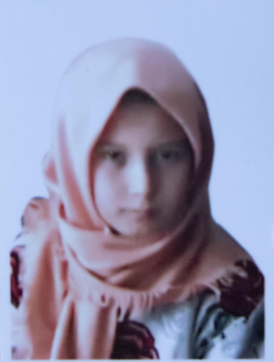 This undated photo released by the family shows Farzana Fazili who was among nearly 100 people killed in bombing attacks outside her school on May 8, 2021. Thirteen -year old Farzana Fazili was the jokester in the family said her brother Hamidullah. She too wove carpets in her spare time to earn money for her family. When she wasn't teasing her younger brother, she would help him with his homework. (AP Photo)