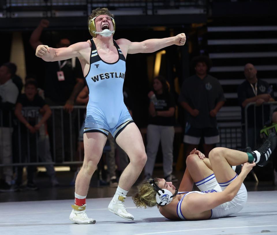 Brayden Robison, Westlake, celebrates his win over Hixon Canto, Pleasant Grove, in 157 pounds in the 6A boys wrestling state championships at UVU in Orem on Saturday, Feb. 17, 2024. | Jeffrey D. Allred, Deseret News