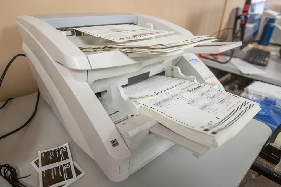 Ballots are counted at the Pueblo County Elections Department on Thursday, Nov. 3, 2022.