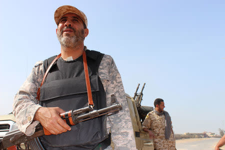 Members of the Libyan internationally recognised government forces are seen at Khallat Farjan area in Tripoli, Libya April 20, 2019. REUTERS/Ayman al-Sahili