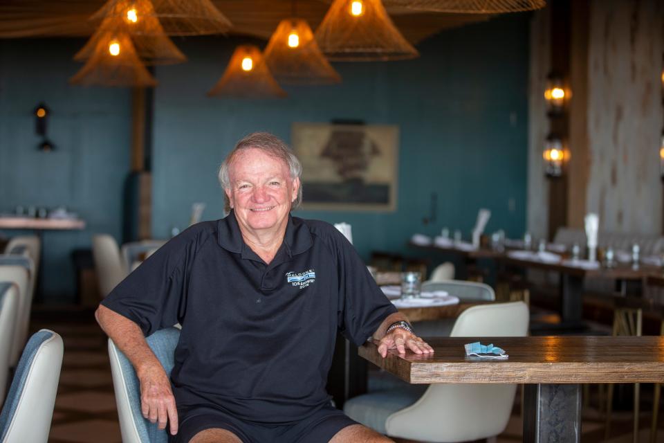 Owner Tim McLoone sit inside his Iron Whale restaurant in Asbury Park.