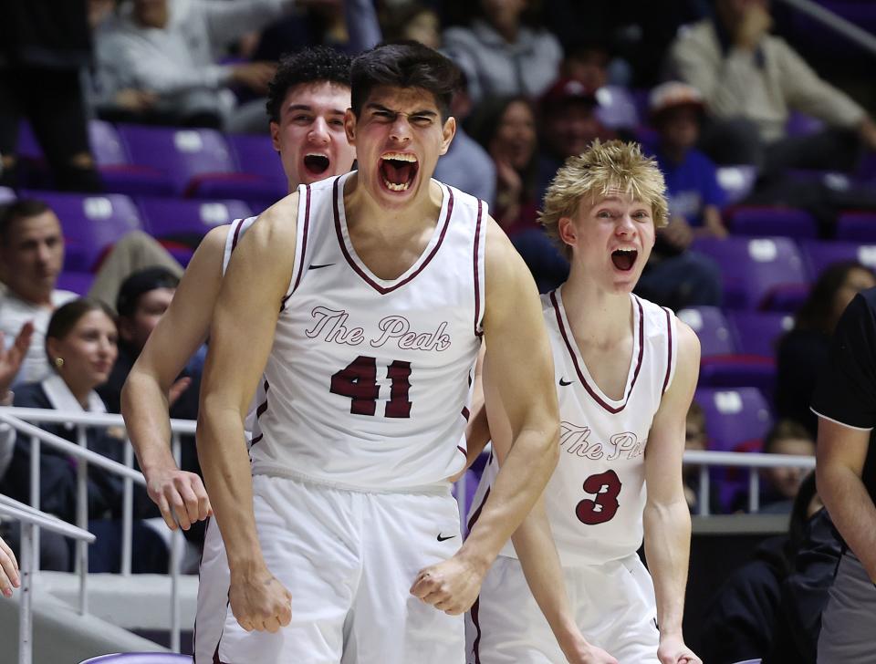 Lone Peak’s Jorge Suarez and his teammates cheer after a 3-pointer as they and Davis play in the quarterfinals of the boys high school basketball playoffs at the Dee Events Center at Weber State in Ogden on Tuesday, Feb. 28, 2023. Lone Peak won 54-52. | Scott G Winterton, Deseret News