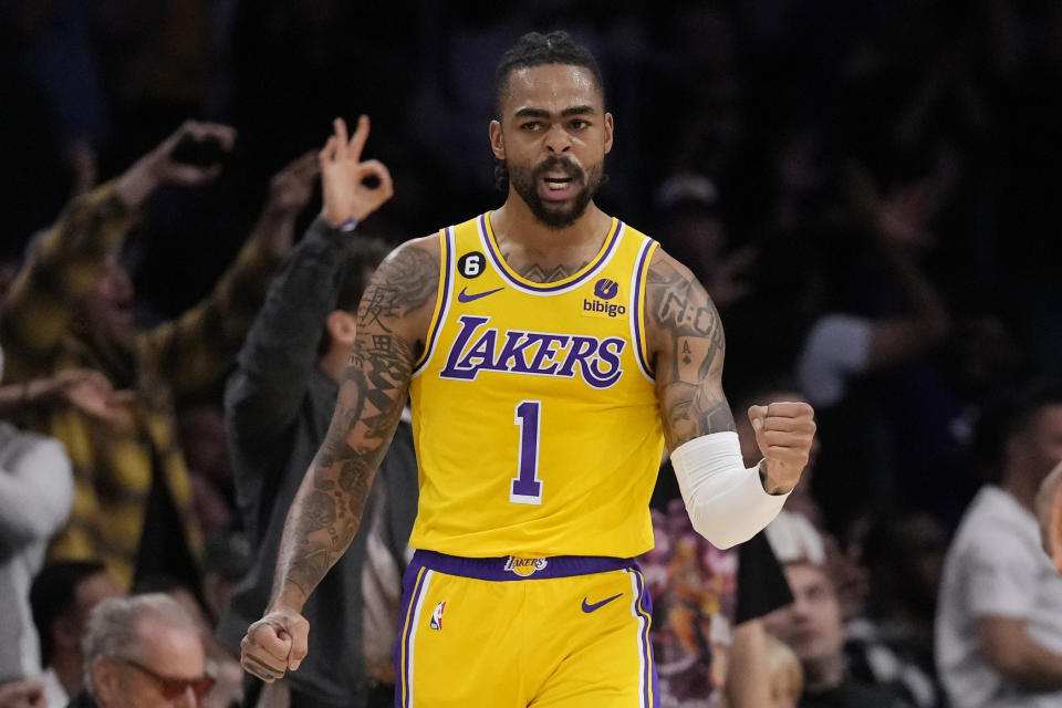 Los Angeles Lakers guard D'Angelo Russell (1) reacts after scoring against the Golden State Warriors during the first half in Game 6 of an NBA basketball Western Conference semifinal series Friday, May 12, 2023, in Los Angeles. (AP Photo/Ashley Landis)