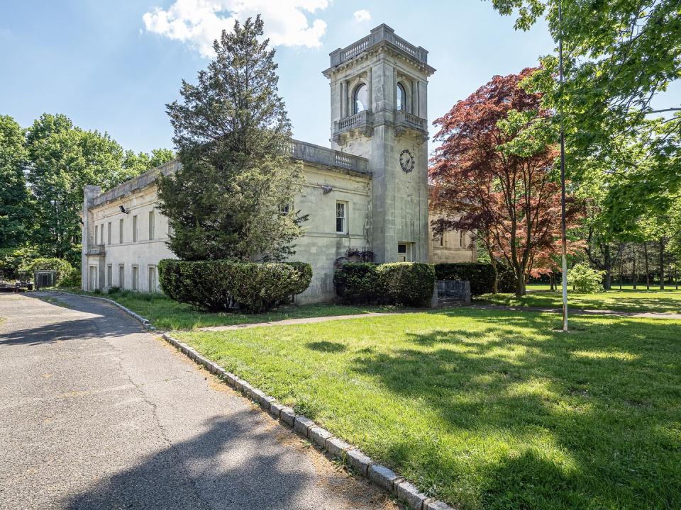 Included on the property is a separate structure with a clock tower and room for 11 cars.