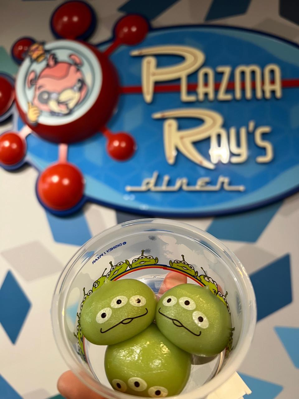 Green Alien Mochi are among the most popular snacks across Tokyo Disney Resort.