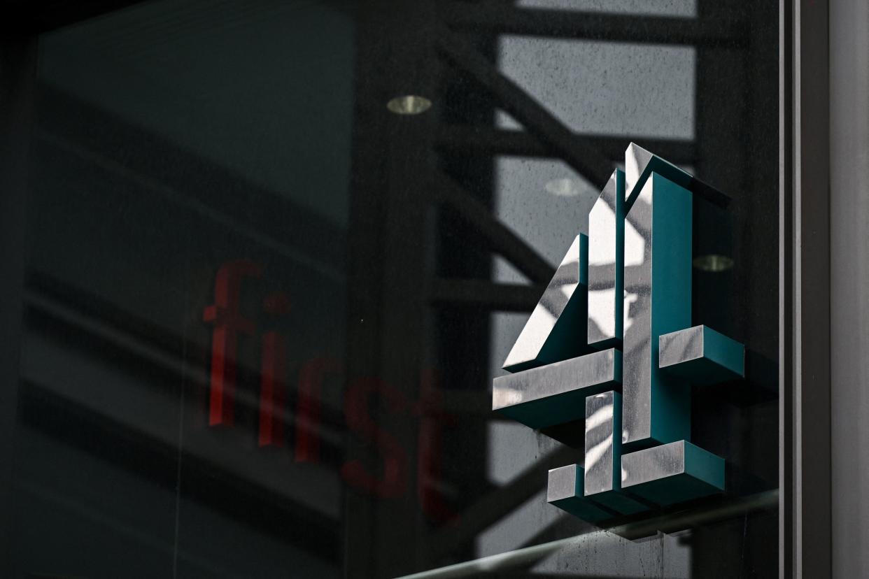 A photograph taken on April 5, 2022 shows the logo of Channel 4 at the TV network headquarters in London, as Britain's government plans to privatise the television channel. - The government plans to privatise Britain's free-to-air public-service television network Channel 4, arguing that it otherwise cannot keep up with streaming giants such as Netflix and Amazon. The company launched in 1982 and its remit involves supporting Britain's independent production sector and producing a unique and diverse range of programmes. The publicly-owned but commercially-funded broadcaster draws 90 percent of its income from advertising. (Photo by JUSTIN TALLIS / AFP) (Photo by JUSTIN TALLIS/AFP via Getty Images)