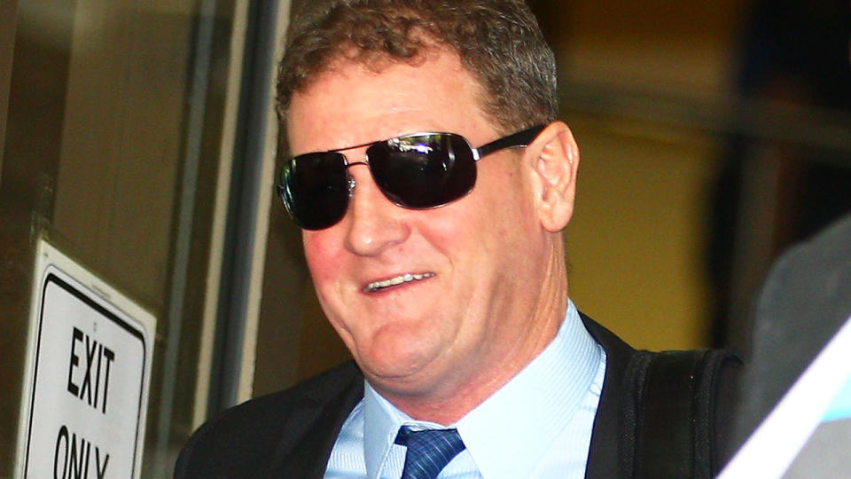 Pictured here, former AFL player agent Ricky Nixon outside a Melbourne court.