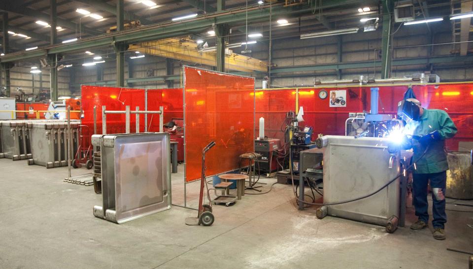 In this News-Leader file photo, Custom Metalcraft  makes stainless steel processing equipment and tanks for the food, beverage, chemical, petroleum and pharmaceutical industries.