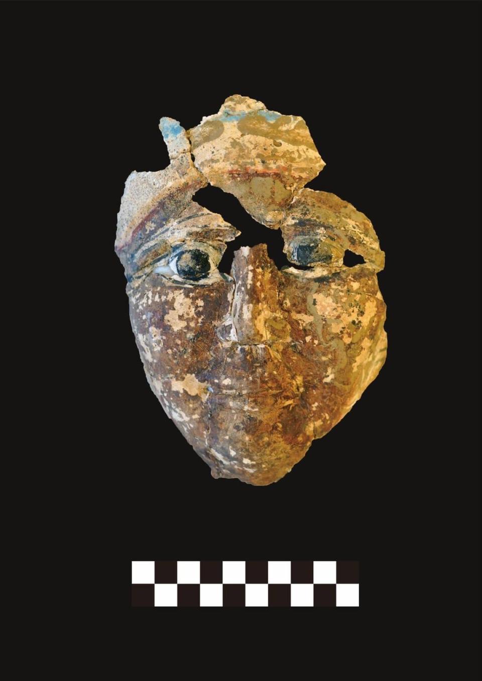 One of the burial masks found at the Saqqara site.