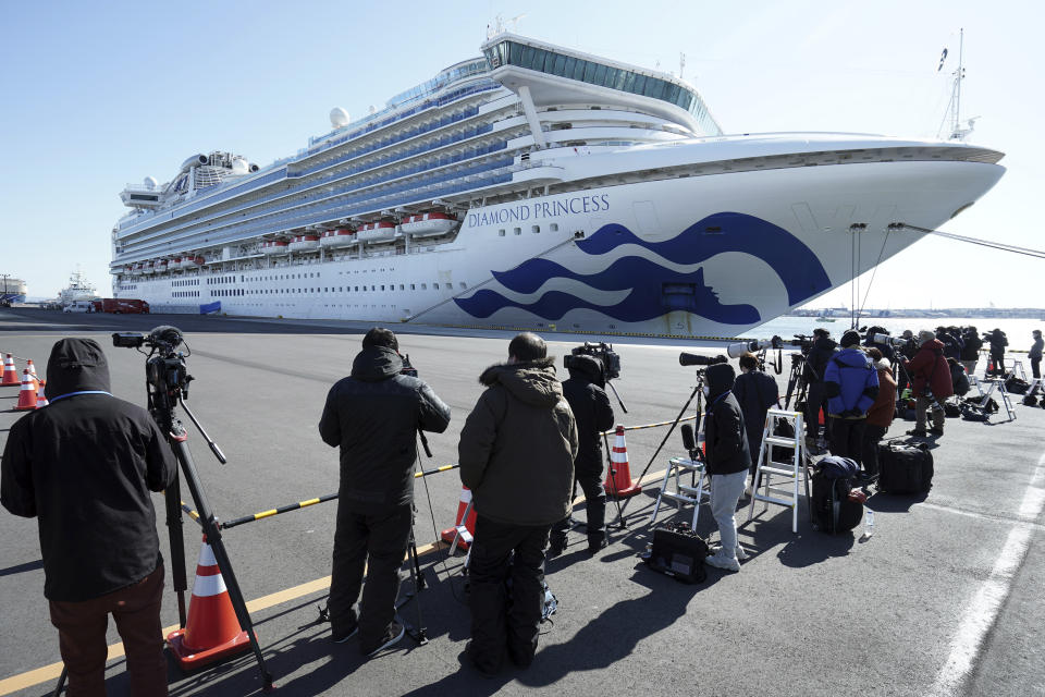 FILE - In this Feb. 9, 2020, file photo, the cruise ship Diamond Princess is anchored off the Yokohama Port in Yokohama, near Tokyo. The virus outbreak that began in China and has spread to more than 20 countries is stretching already-strained public health systems in Asia and beyond, raising questions over whether everyone can get equal access to treatment. (AP Photo/Eugene Hoshiko, File)