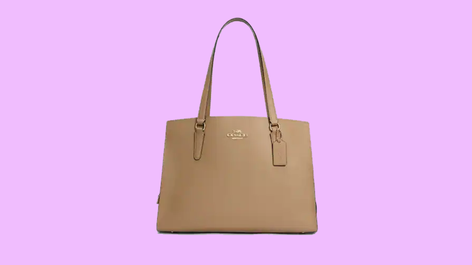 Get the Coach Outlet Tatum 40 Carryall bag for $145.52.