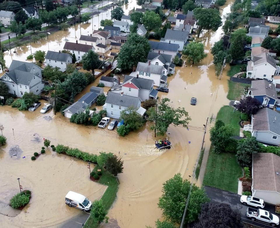 Overnight heavy rains left John Street in Helmetta, N.J. flooded Sunday afternoon, August 22, 2021. 