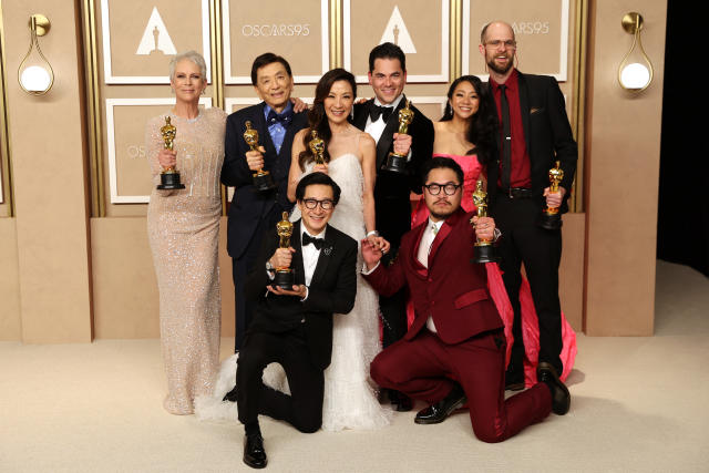 Daniel Kwan, Daniel Scheinert and Jonathan Wang pose with the Oscar for Best Picture for 