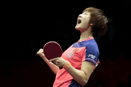 China's Ding Ning reacts after defeating her compatriot Liu Shiwen in the women's singles final table tennis match at the World Table Tennis Championships in Suzhou, Jiangsu province May 2, 2015. REUTERS/Aly Song